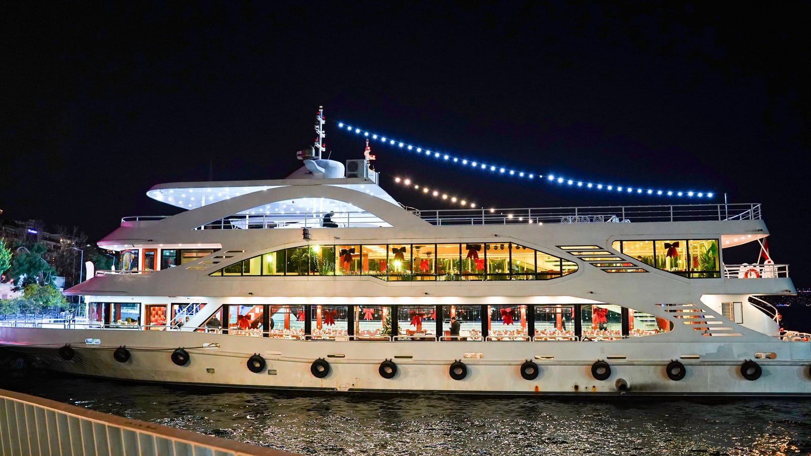 The AMOR lit up on the Bosphorus at night, Istanbul