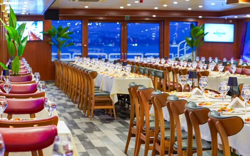 AMOR dining salon with tables set before boarding