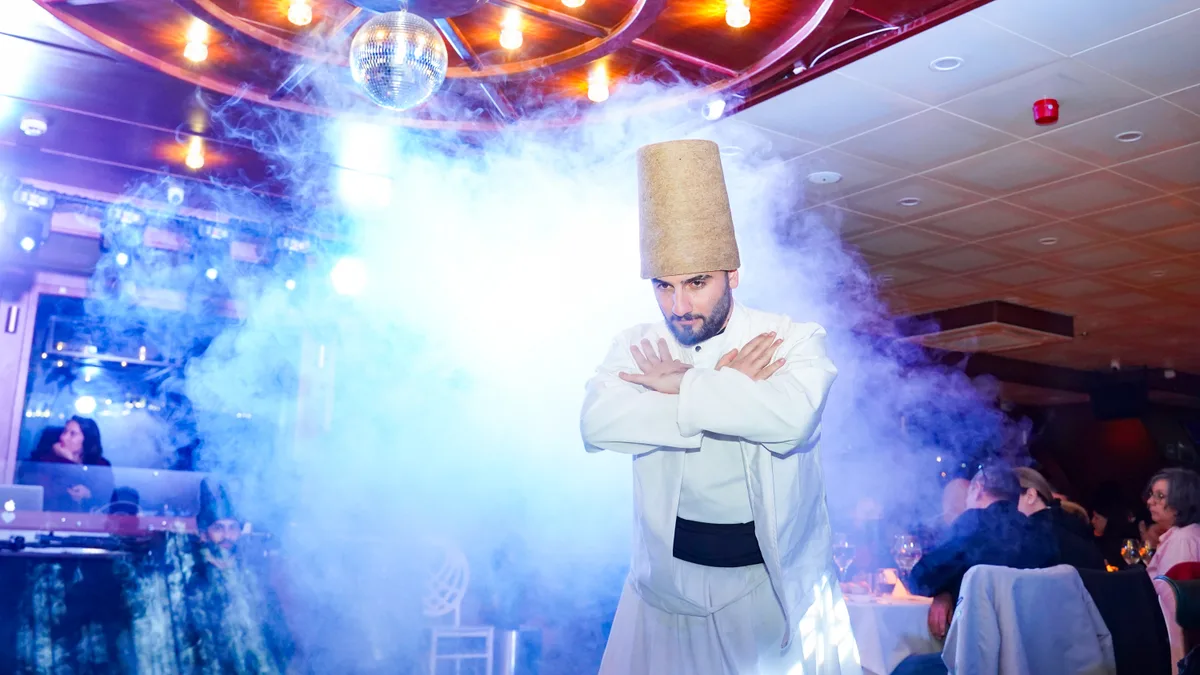 Whirling dervish performing the Mevlevi Sema on the AMOR