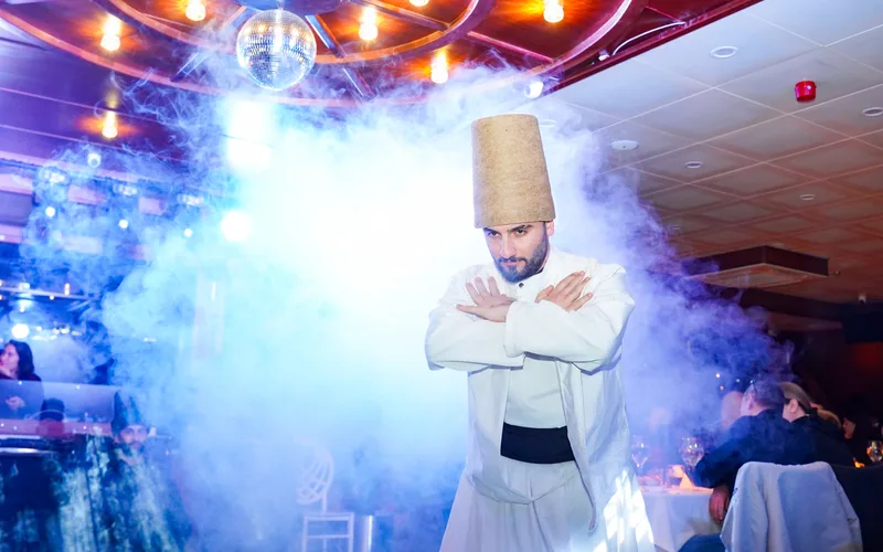 Whirling dervish performance on stage