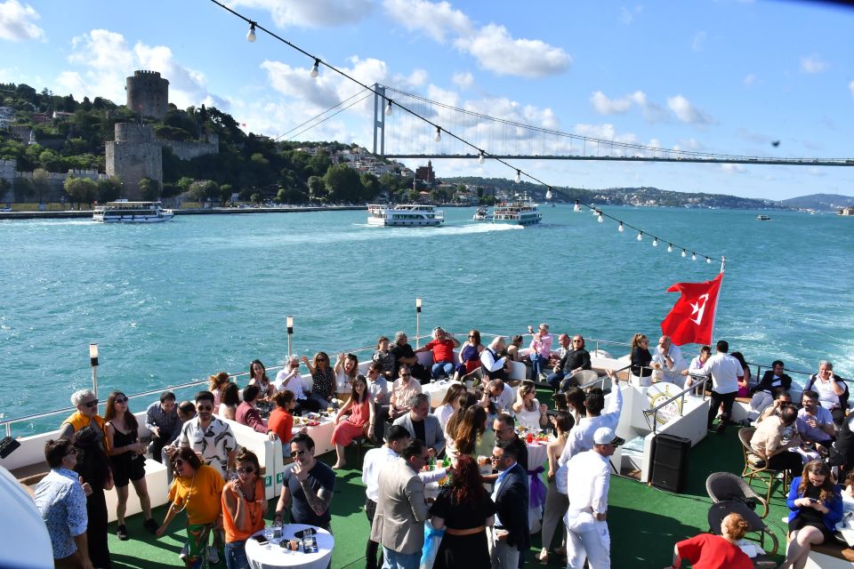 Families enjoying the deck of a Bosphorus cruise